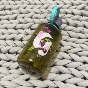Glossier Green Water Bottle with Floral Design